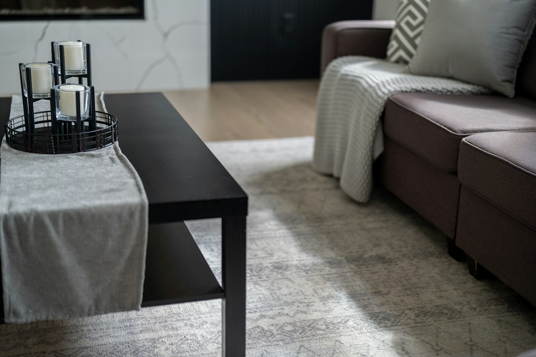 Modern living room with dark coffee table and sofa