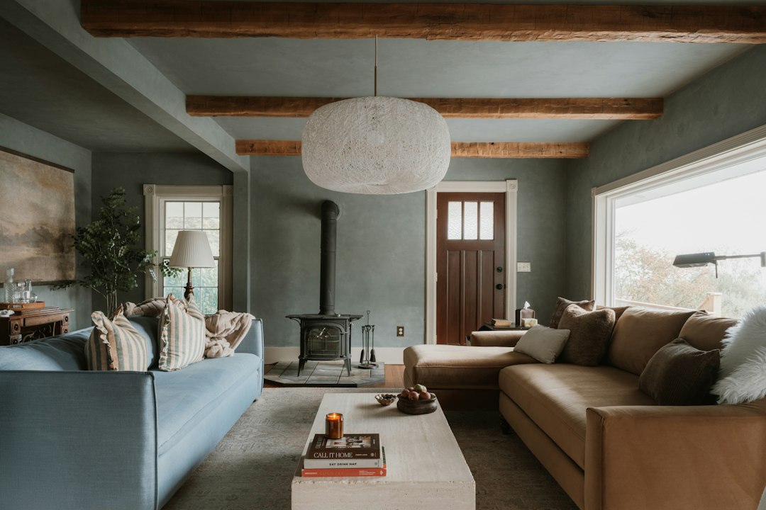 Cozy living room with sectional sofa and wood stove