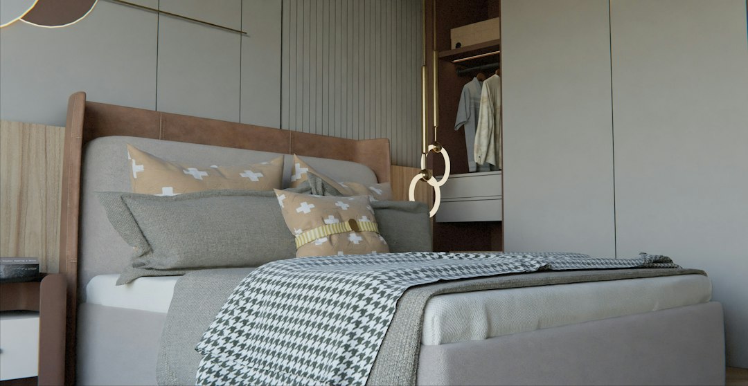 Modern bedroom with a neatly made bed and open closet